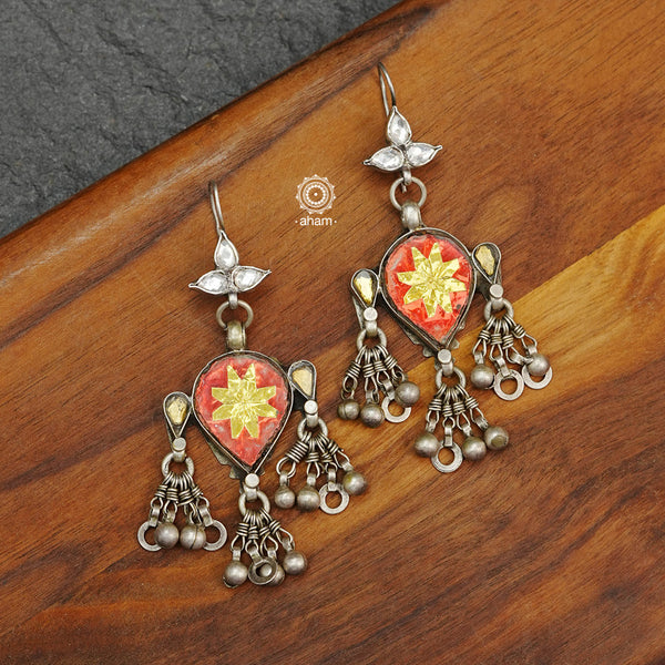 Tribal silver earrings with statement ghungroos. Created with traditional artistry and craftsmanship. An ode to the glorious state of Rajasthan. Pair these with your ethnic outfit for a classic look.