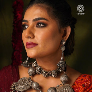 These Vintage Tribal Silver Earrings are the perfect statement piece for your Navratri attire. Get your festive shopping started with these beautiful earrings.