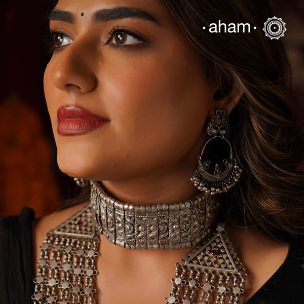 Expertly crafted vintage silver chandbali hoops featuring elegant peacock studs for effortless wearing. A timeless addition to your collection, these hoops offer a touch of tradition to any outfit.