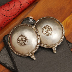 Tribal silver oversized studs.  There is a different charm to old world pieces. So unique, so beautiful, heirloom pieces.  Tribal silver earrings that will make a beautiful edition to your collection. Please note since these are made from assorted old pieces, there might be some minor variations between the two pieces.  These pieces were a part of a vintage neckpiece that have been converted into earrings. 