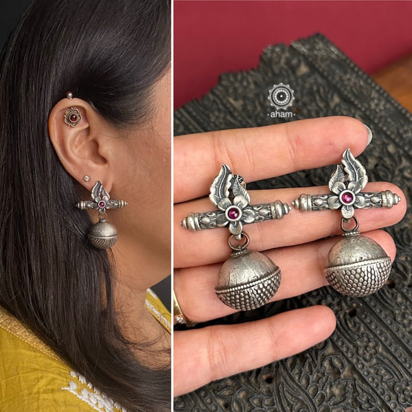 Experience the bold and unique style of our Tribal Borla Silver Earring. Handcrafted with two beautiful tribal borlas and made from high-quality silver, this earring is a stunning addition to any jewelry collection. Elevate your look with this one-of-a-kind piece that perfectly blends traditional and modern influences.