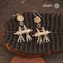 Crafted from carefully sourced tribal elements, our Tribal Amulet Silver Earrings feature a delicate flower top paired with an amulet drop adorned with hanging beads. A reflection of tribal heritage and intricate artistry, these silver earrings offer a bold yet elegant statement for those who love authentic tribal jewellery.