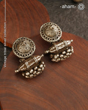 An exquisite fusion of the past and present, these&nbsp;Vintage Tribal Earrings&nbsp;unite two stunning silver pieces. The top features a newly made stud with old world feel, while the bottom showcases a vintage&nbsp;amulet, steeped in history. Handcrafted in&nbsp;silver, this unique piece is a must-have for those who cherish&nbsp;tribal heritage jewellery&nbsp;with a story to tell.