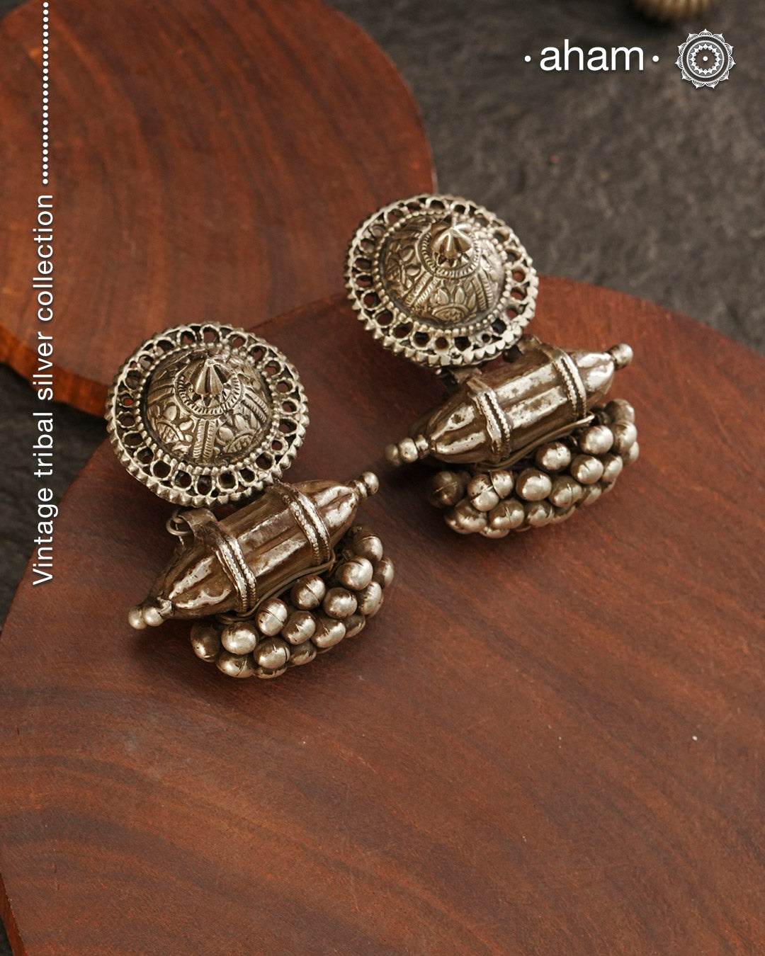 An exquisite fusion of the past and present, these Vintage Tribal Earrings unite two stunning silver pieces. The top features a newly made stud with old world feel, while the bottom showcases a vintage amulet, steeped in history. Handcrafted in silver, this unique piece is a must-have for those who cherish tribal heritage jewellery with a story to tell.
