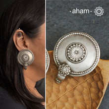 Tribal silver oversized studs.
There is a different charm to old world pieces. So unique, so beautiful, heirloom pieces.Tribal silver earrings that will make a beautiful edition to your collection.Please note since these are made from assorted old pieces, there might be some minor variations between the two pieces.  These pieces were a part of a vintage neckpiece that have been converted into earrings.