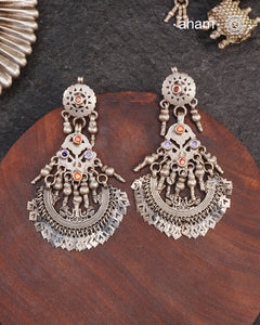 A classic design from Rajasthan's tribal heritage, these Tribal Silver Bali Earrings feature beautiful cutwork silver leaves at the bottom.