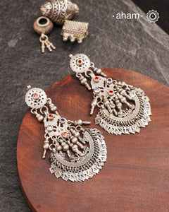 A classic design from Rajasthan's tribal heritage, these Tribal Silver Bali Earrings feature beautiful cutwork silver leaves at the bottom.