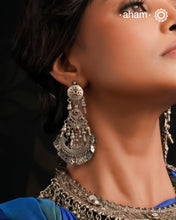 A classic design from Rajasthan's tribal heritage, these Tribal Silver Bali Earrings feature beautiful cutwork silver leaves at the bottom.