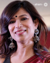 Statement Tribal Silver Jhumkie Earrings - These bold, handcrafted silver jhumkie earrings. The bold ghungroos create a delightful sound with every movement, adding a playful yet traditional touch. Perfect for those who appreciate heritage jewellery, these earrings are an eye-catching addition to any collection.