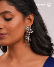 Tribal Earrings created in silver with traditional artistry and craftsmanship.