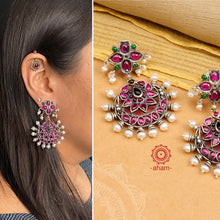 Classic Kemp 92.5 sterling silver earrings laced with pearls.