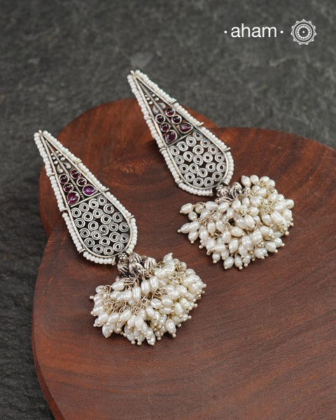 Handcrafted 92.5 Sterling Silver Earrings with stunning bunch of rice shaped pearls.