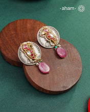 Handcrafted Noori two tone coin earrings in silver with pink semi precious stone. With beautiful bird motif and embellished cultured pearls.&nbsp;Style this up with your favourite ethnic or fusion outfit.