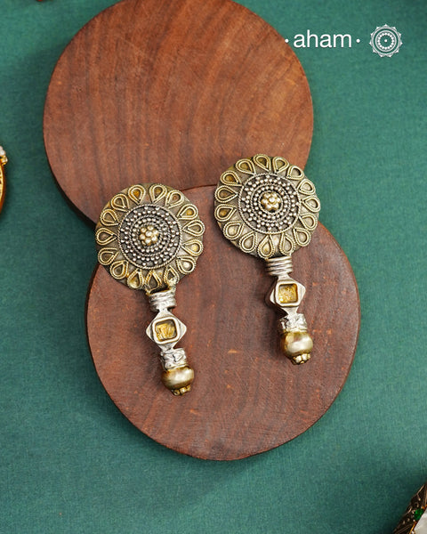 Handcrafted Noori two tone earrings in 92.5 sterling silver with beautiful floral  work. Style this up with your favourite ethnic or fusion outfit.