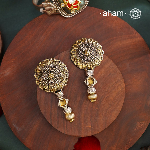 Handcrafted Noori two tone earrings in 92.5 sterling silver with beautiful floral  work. Style this up with your favourite ethnic or fusion outfit.