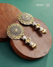 Handcrafted Noori two tone earrings in 92.5 sterling silver with beautiful floral  work. Style this up with your favourite ethnic or fusion outfit.