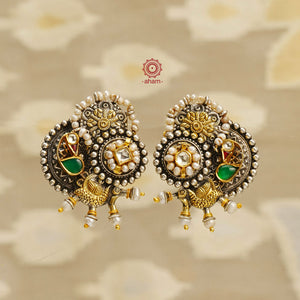 Noori two tone earrings, handcrafted in 92.5 sterling silver with kundan and pearl highlights. Style this up with your favourite ethnic or fusion outfits to complete the look.