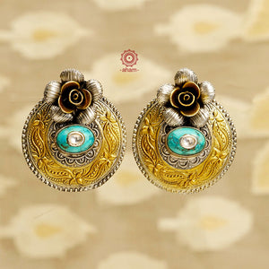 Noori two tone earrings with flower motif and turquoise highlight, handcrafted in 92.5 sterling silver. Style this up with your favourite ethnic or fusion outfits to complete the look.