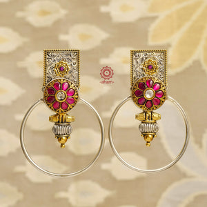 Upgrade your jewellery collection with our Noori Two Tone Silver Earrings. These stunning statement earrings feature 92.5 silver with gold tone highlights and intricate Kundan work. Perfect for both Indian and Western wear, add a touch of elegance and style to any outfit. Expertly designed for a beautiful fusion look.