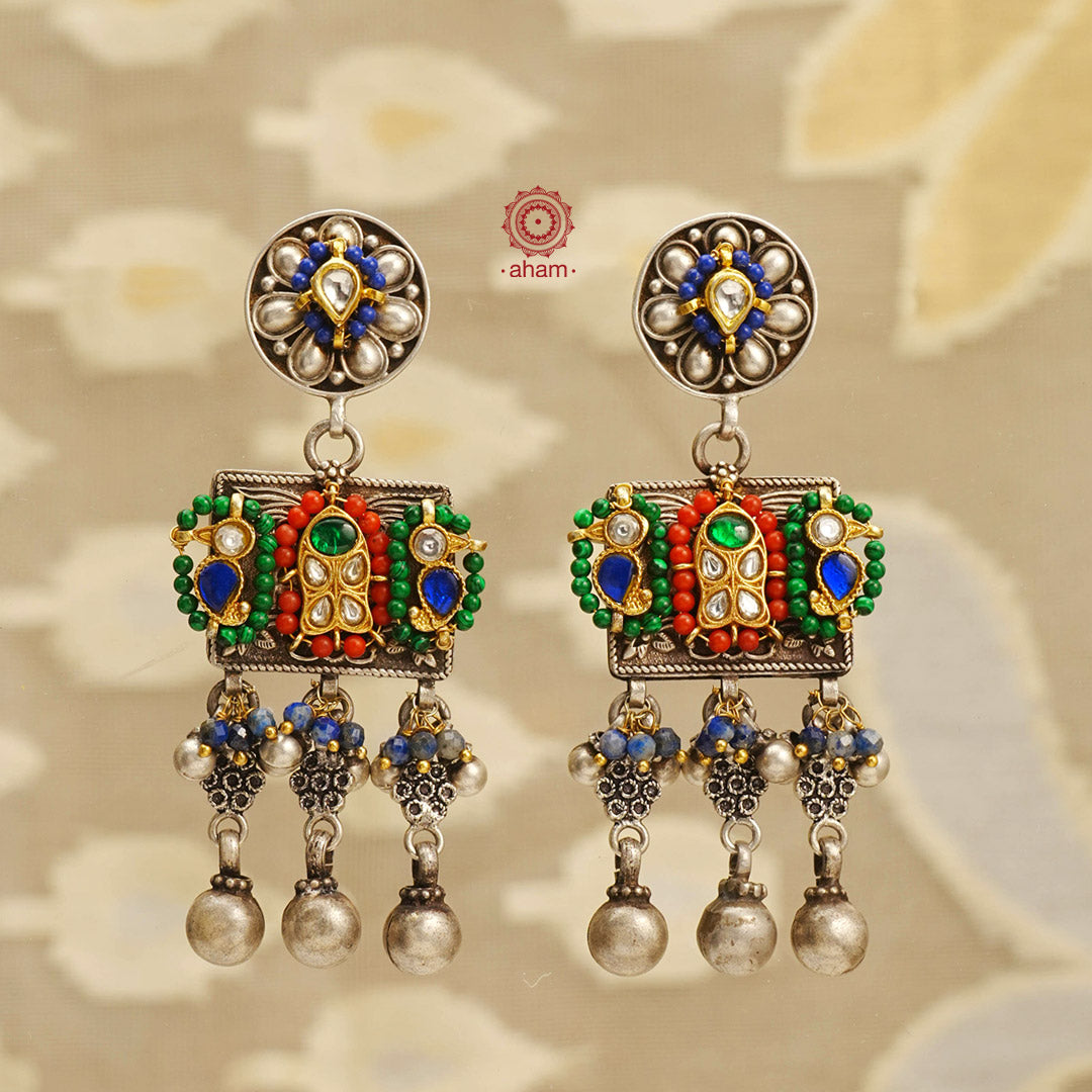 Noori two tone handcrafted earrings in 92.5 sterling silver with dual tones. Eclectic mix of elements with semi precious stones and beads. Style this up with your favourite ethnic or fusion outfit.