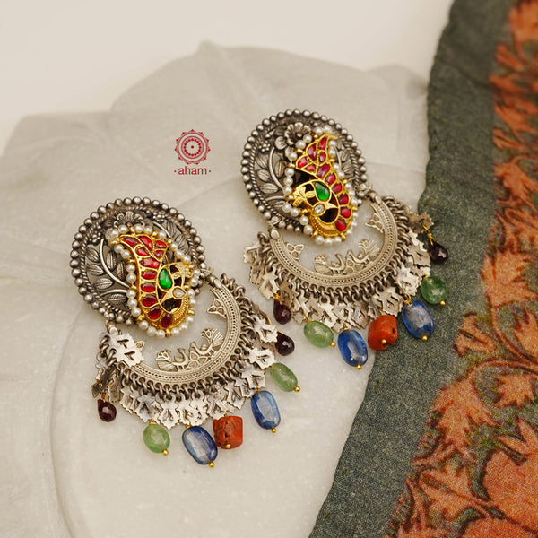 Noori statement silver two tone earrings. One of a kind piece, handcrafted with beautiful bird motif and semi precious stones. Style this up with your favourite ethnic or fusion outfit.