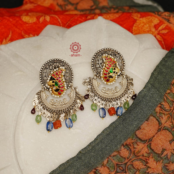 Noori statement silver two tone earrings. One of a kind piece, handcrafted with beautiful bird motif and semi precious stones. Style this up with your favourite ethnic or fusion outfit.
