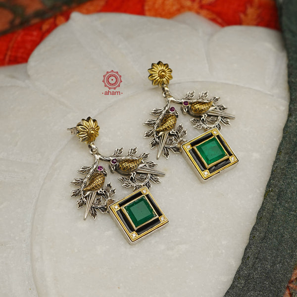 Noori two tone earrings in 92.5 sterling silver with two perfect little birds and a green stone highlight. Style this up with your favourite ethnic or fusion outfit