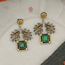 Noori two tone earrings in 92.5 sterling silver with two perfect little birds and a green stone highlight. Style this up with your favourite ethnic or fusion outfit