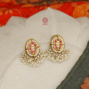 Noori two tone earrings with little pearls. The earrings are handcrafted in 92.5 sterling silver with gold highlights. Style this up with your favourite ethnic or fusion outfits to complete the look.