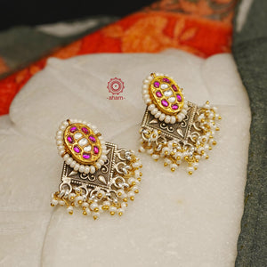Noori two tone earrings with little pearls. The earrings are handcrafted in 92.5 sterling silver with gold highlights. Style this up with your favourite ethnic or fusion outfits to complete the look.