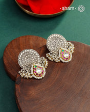 Noori two tone earrings with little pearls. The earrings are handcrafted in 92.5 sterling silver with gold highlights.&nbsp;Style this up with your favourite ethnic or fusion outfits to complete the look.