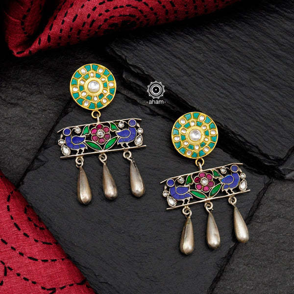 Fun, unique, one of a kind dual tone earrings crafted in silver.  Style this up with your favourite ethnic or fusion outfit.