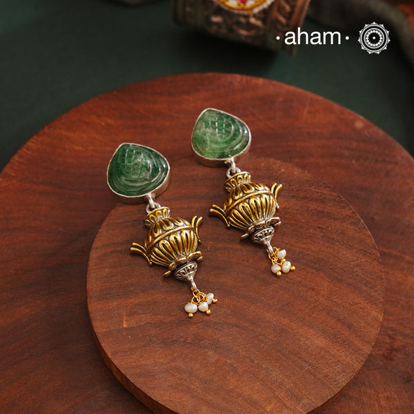 Noori two tone earrings. The earrings are handcrafted in 92.5 sterling silver with craved stone and gold highlights.Style this up with your favourite ethnic or fusion outfits to complete the look.