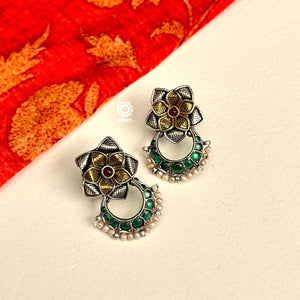 Noori two tone earrings. The earrings are handcrafted in 92.5 sterling silver with gold highlights.Style this up with your favourite ethnic or fusion outfits to complete the look.