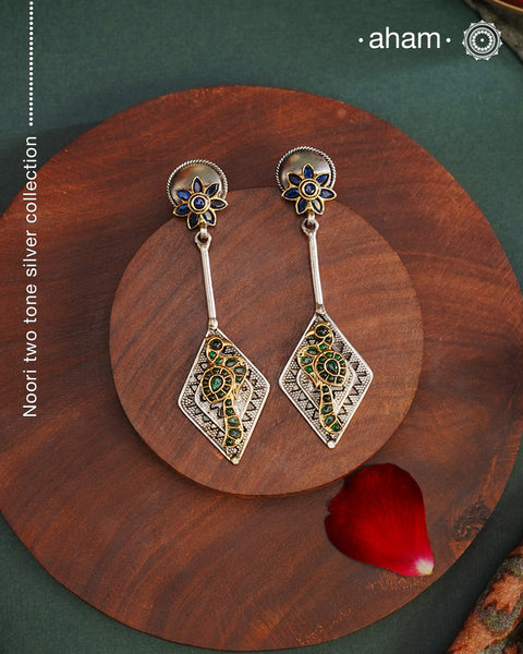 Noori two tone Earrings. The earrings are handcrafted in 92.5 sterling silver with gold highlights. Style this up with your favourite ethnic or fusion outfits to complete the look.