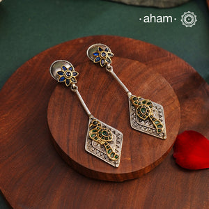 Noori two tone Earrings. The earrings are handcrafted in 92.5 sterling silver with gold highlights. Style this up with your favourite ethnic or fusion outfits to complete the look.