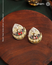 Noori two tone Earrings. The earrings are handcrafted in 92.5 sterling silver with gold highlights. Style this up with your favourite ethnic or fusion outfits to complete the look.