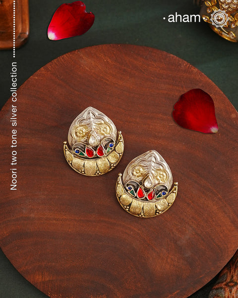 Noori two tone Earrings. The earrings are handcrafted in 92.5 sterling silver with gold highlights. Style this up with your favourite ethnic or fusion outfits to complete the look.