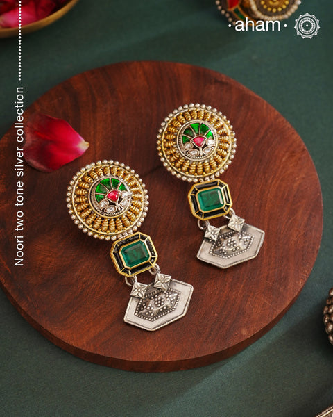 Noori two tone Earrings. The earrings are handcrafted in 92.5 sterling silver with gold highlights. Style this up with your favourite ethnic or fusion outfits to complete the look.