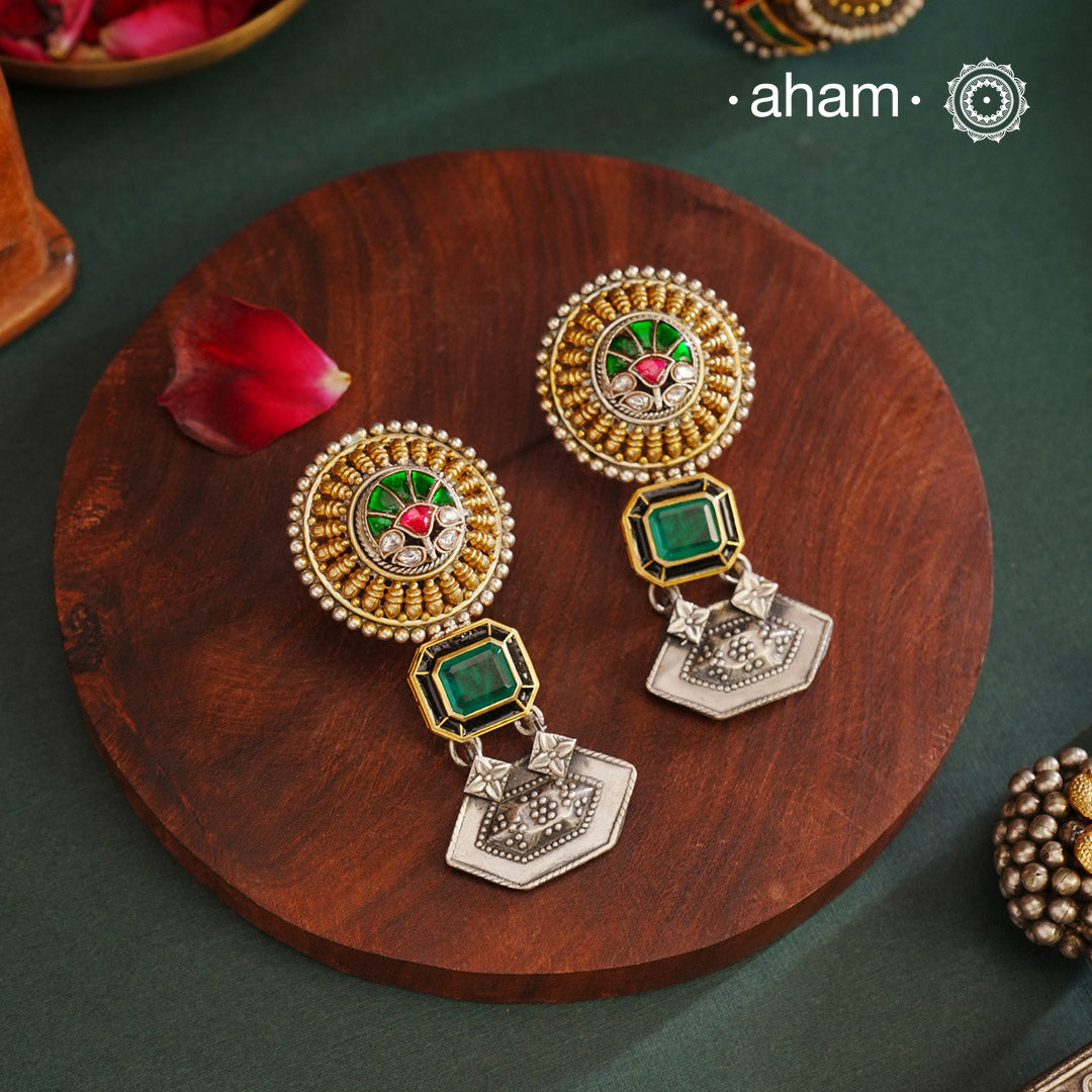 Noori two tone Earrings. The earrings are handcrafted in 92.5 sterling silver with gold highlights. Style this up with your favourite ethnic or fusion outfits to complete the look.