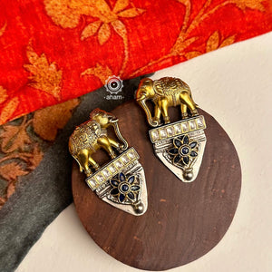 Noori two tone Earrings. The earrings are handcrafted in 92.5 sterling silver with gold highlights. Style this up with your favourite ethnic or fusion outfits to complete the look.