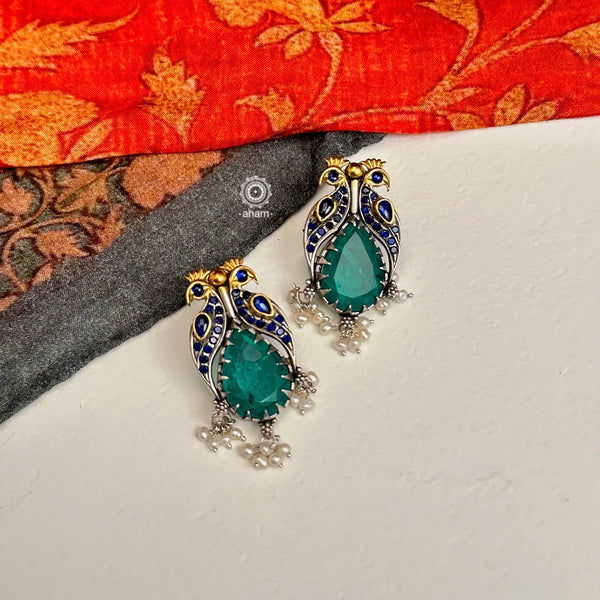 Noori two tone Earrings. The earrings are handcrafted in 92.5 sterling silver with gold highlights. Style this up with your favourite ethnic or fusion outfits to complete the look.