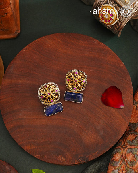 Noori two tone Earrings. The earrings are handcrafted in 92.5 sterling silver with gold highlights. Style this up with your favourite ethnic or fusion outfits to complete the look.