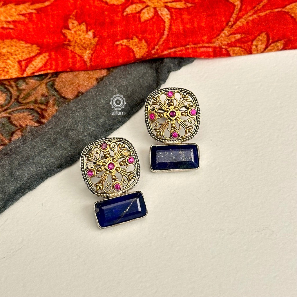 Noori two tone Earrings. The earrings are handcrafted in 92.5 sterling silver with gold highlights. Style this up with your favourite ethnic or fusion outfits to complete the look.