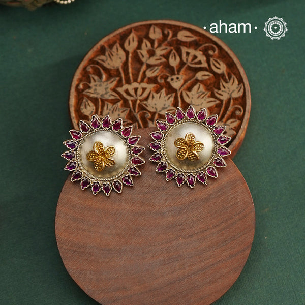Noori two tone Earrings. The earrings are handcrafted in 92.5 sterling silver with gold highlights and pink stones. Style this up with your favourite ethnic or fusion outfits to complete the look.