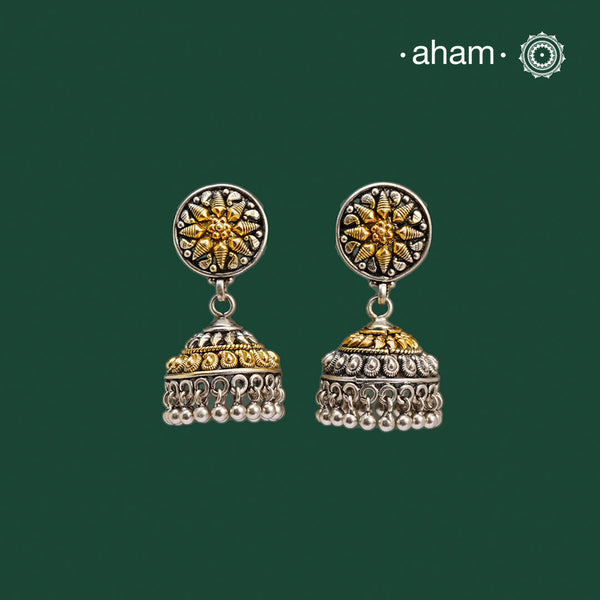 Noori two tone Earrings. The earrings are handcrafted in 92.5 sterling silver with gold highlights. Style this up with your favourite ethnic or fusion outfits to complete the look.