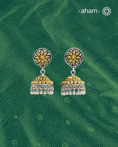 Noori two tone Earrings. The earrings are handcrafted in 92.5 sterling silver with gold highlights. Style this up with your favourite ethnic or fusion outfits to complete the look.