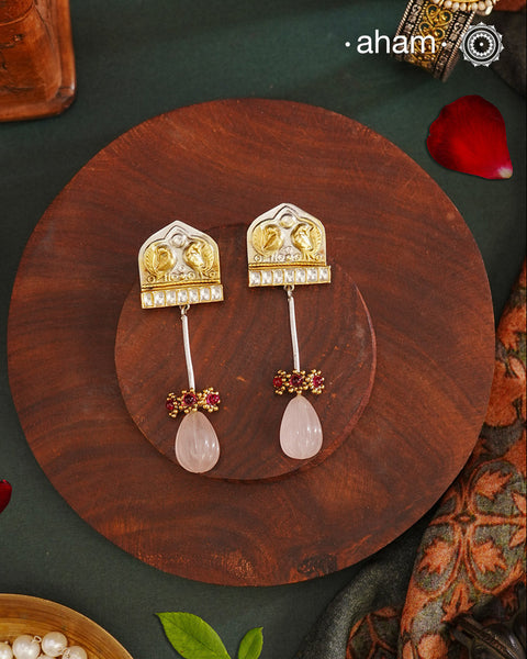 Noori two tone Earrings. The earrings are handcrafted in 92.5 sterling silver with gold highlights and a rose quartz drop. Style this up with your favourite ethnic or fusion outfits to complete the look.