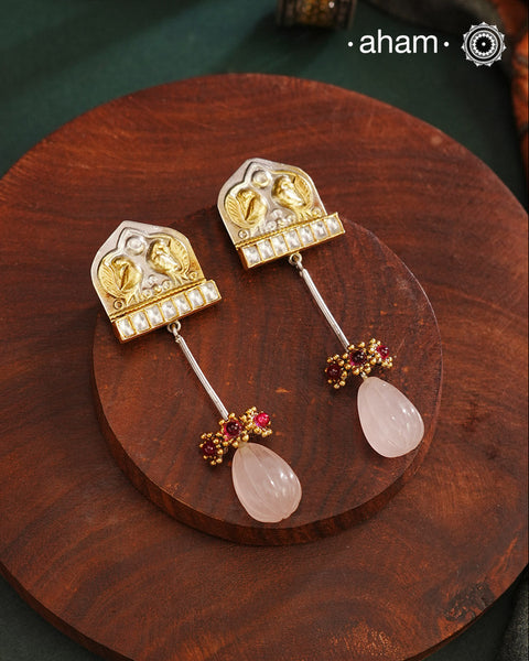 Noori two tone Earrings. The earrings are handcrafted in 92.5 sterling silver with gold highlights and a rose quartz drop. Style this up with your favourite ethnic or fusion outfits to complete the look.