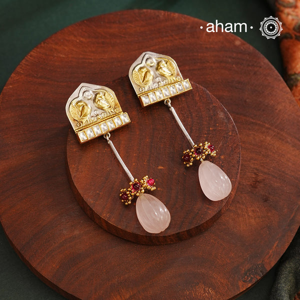 Noori two tone Earrings. The earrings are handcrafted in 92.5 sterling silver with gold highlights and a rose quartz drop. Style this up with your favourite ethnic or fusion outfits to complete the look.